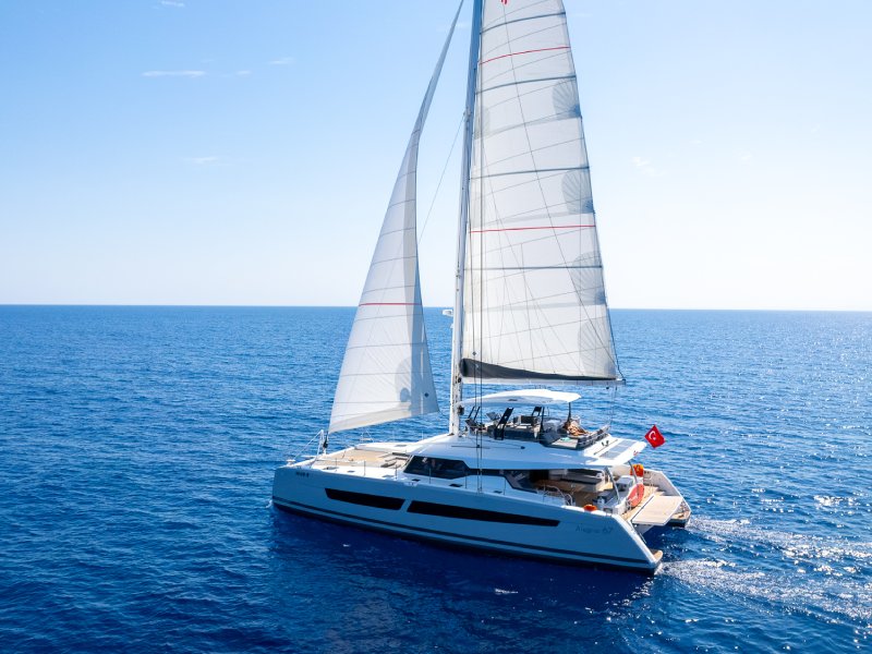 Ekmar Yachting Mus 3 Catamaran Open Sails Cruising Side View
