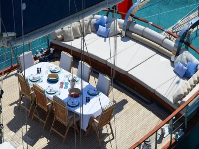 Ekmar Yachting Blue Heaven Gulet Yacht Anchored In Bay Al Fresco Dining Area Zoomed View 400x300