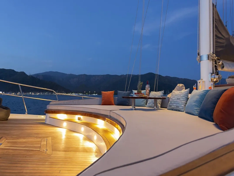 Ekmar Yachting Diva Deniz Gulet Yacht Cruising Bow Evening Side View